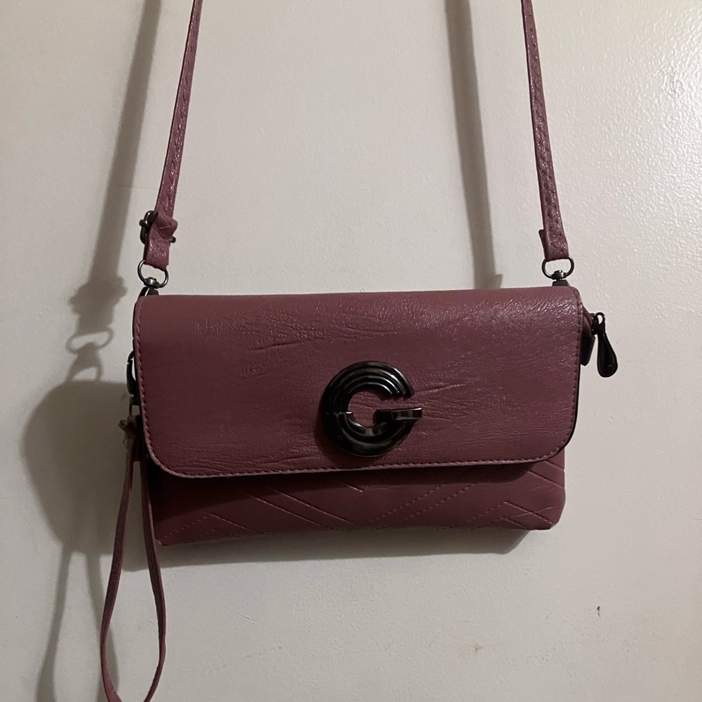 Chic Mauve Clutch with Wristlet. Looks beautiful & maybe leather not 100% sure.